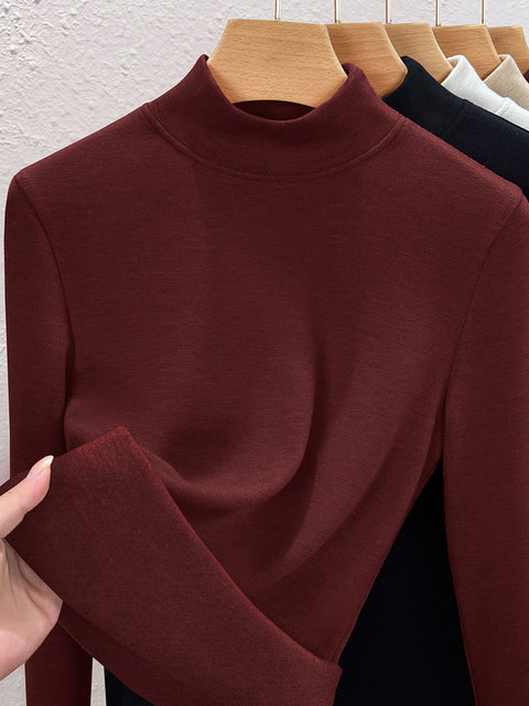 Blusa informal de invierno con cuello alto y parte inferior de color puro para mujer