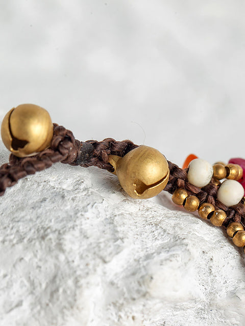 Pulsera turquesa tejida con elefante bohemio para mujer